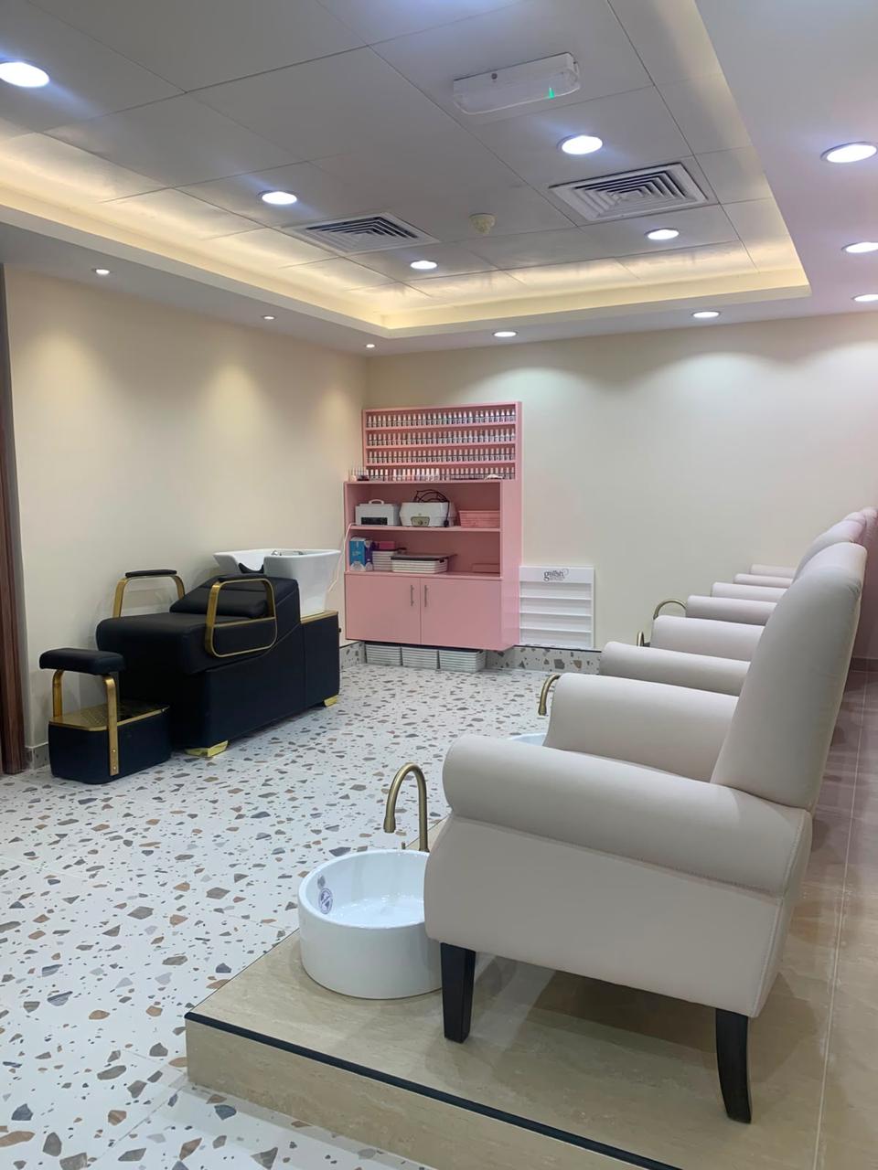 Manicure and pedicure area with dedicated treatment chairs at Magic Princess Salon