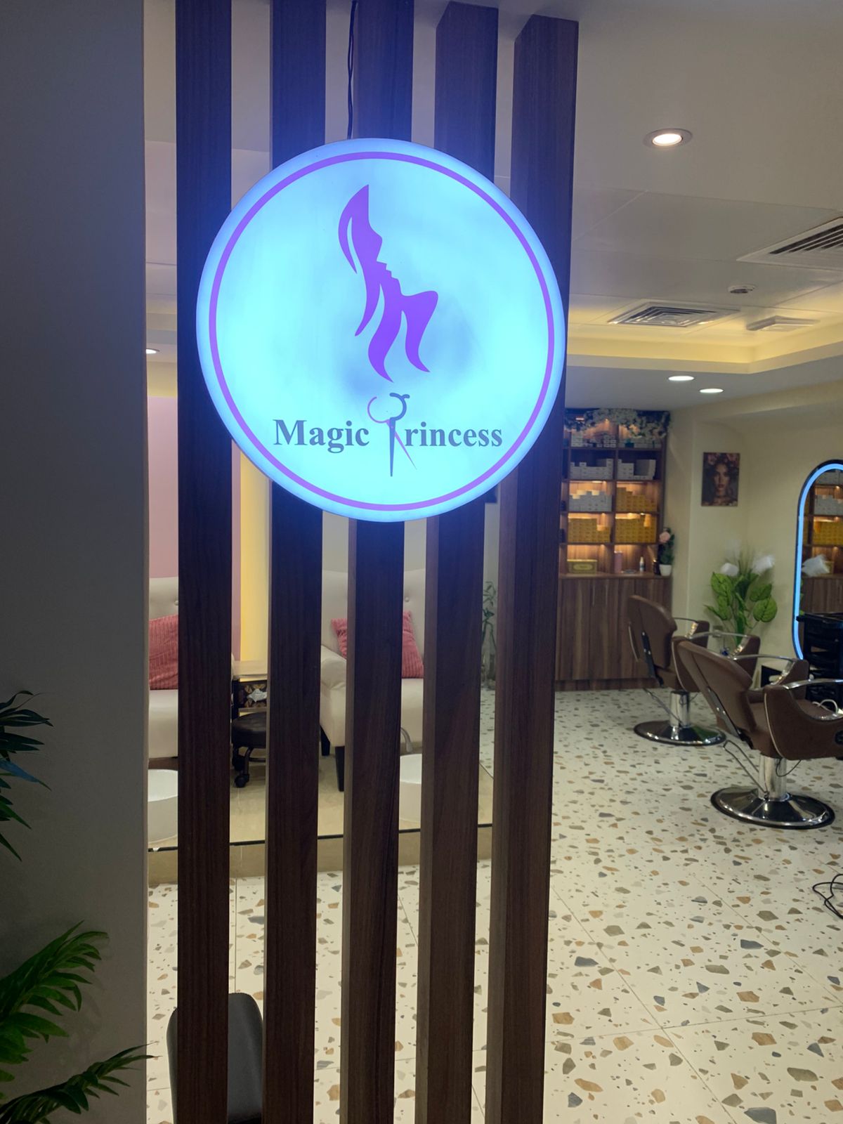 Magic Princess salon entrance sign and styling area